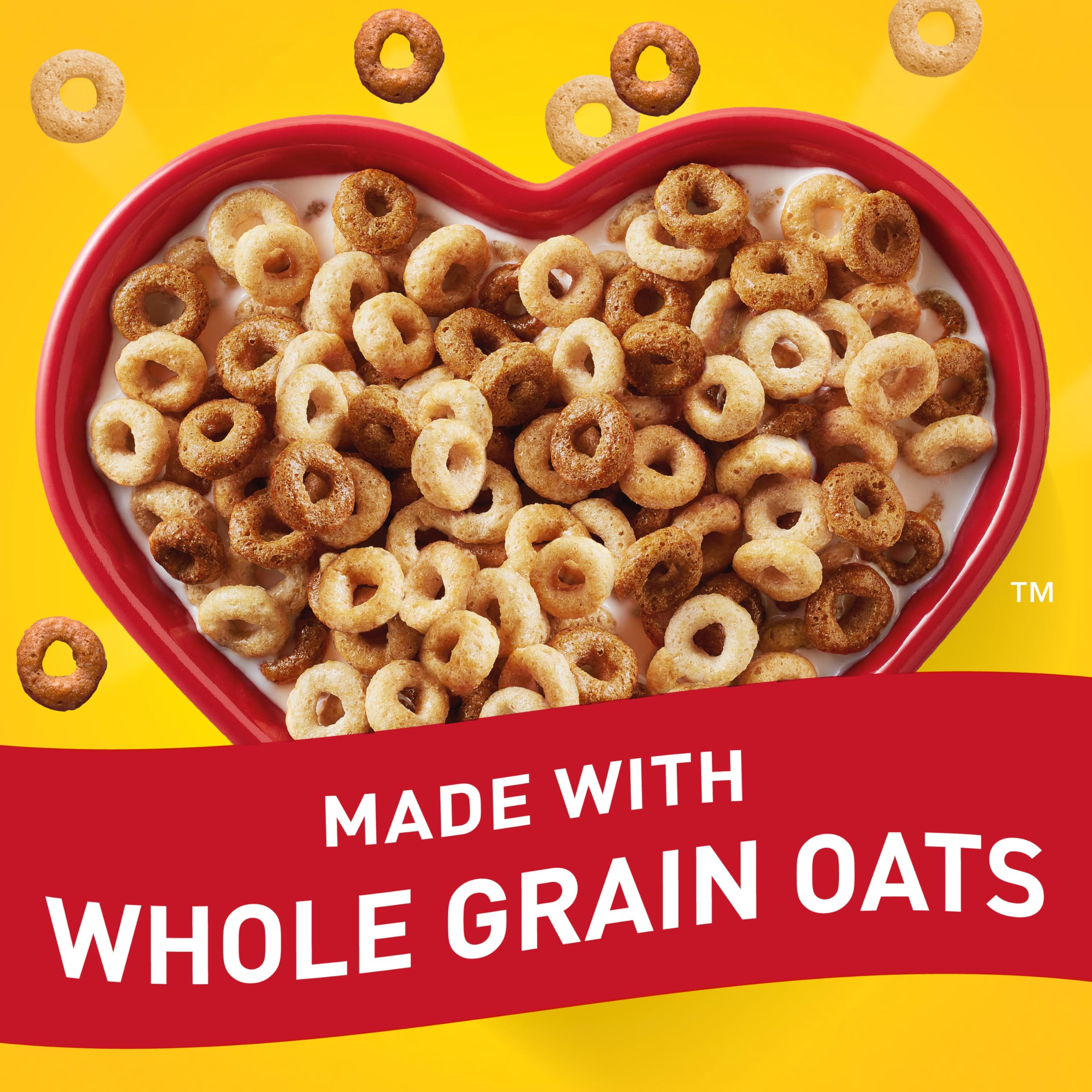 Pouring Cheerios Multi Grain cereal into a bowl.