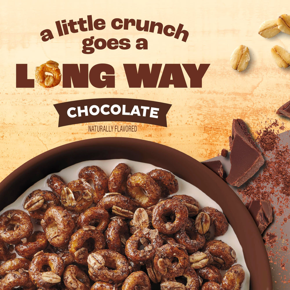 Cheerios Oat Crunch Chocolate milk pour pairing cereal with milk for a balanced breakfast