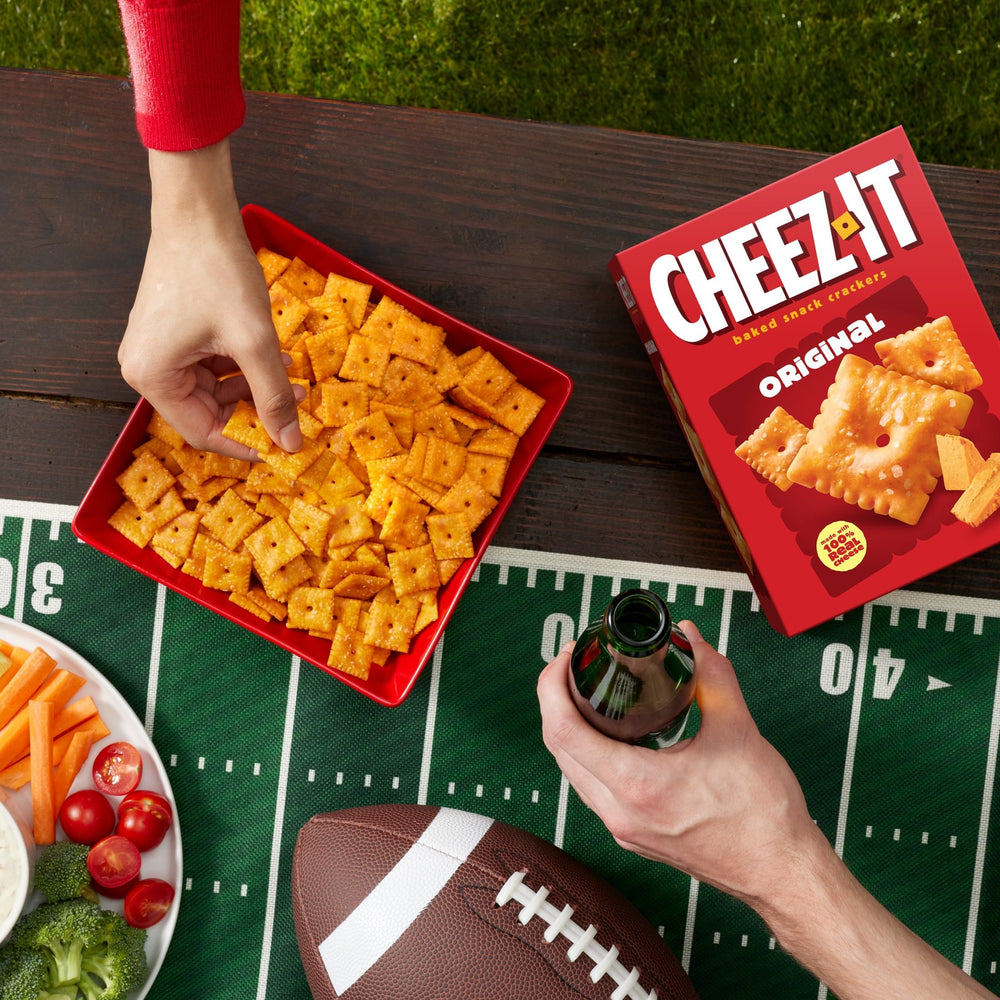 Cheez-It crackers arranged for game night, family-friendly snacking ambience.