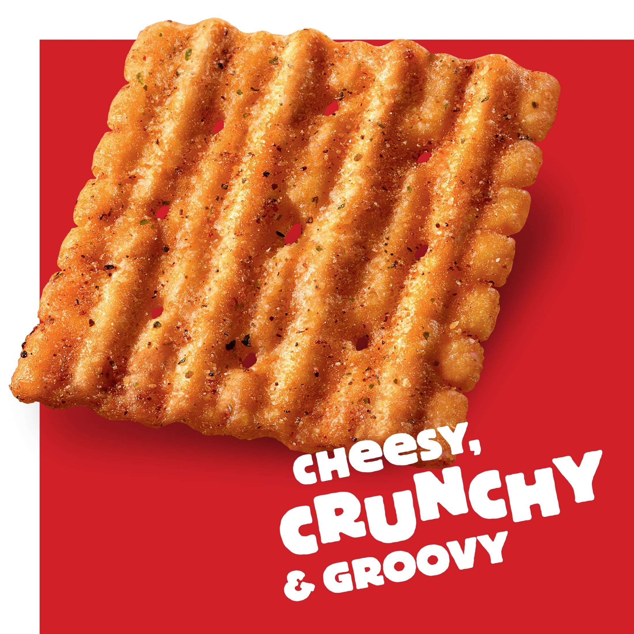 Cheez-It Grooves Loaded Nacho crackers beside dip for party snacking.