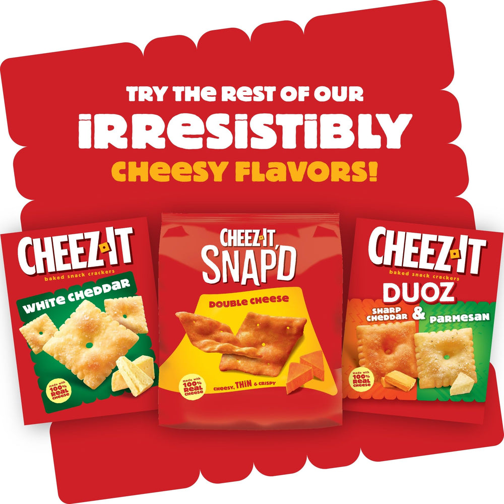 Cheez-It Grooves Loaded Nacho crackers on a coffee table at a game night.