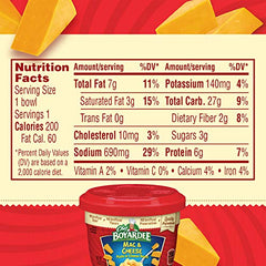 Chef Boyardee Mac & Cheese bowl lid off reveals creamy cheese sauce for easy serving.