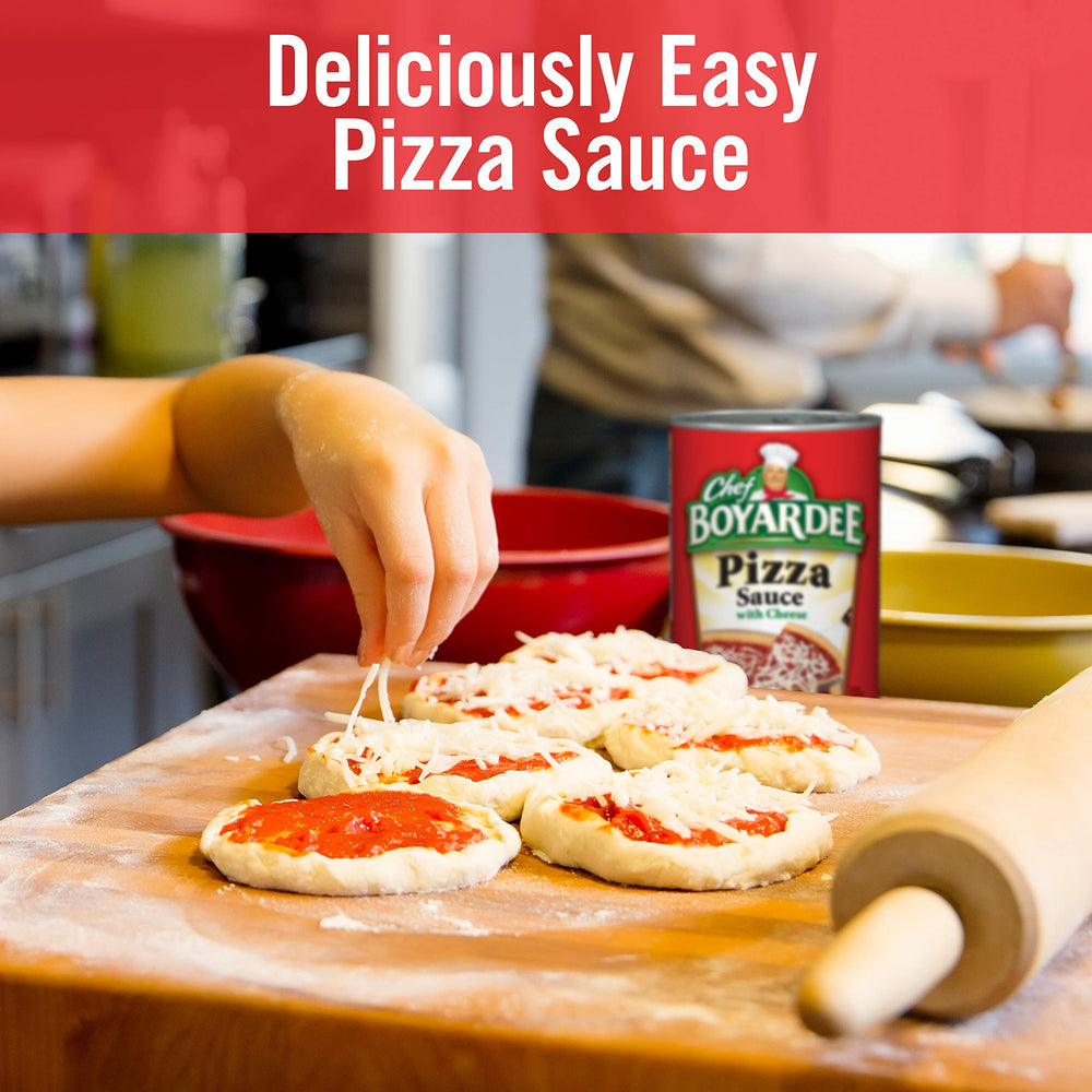 Chef Boyardee sauce on plate with melted cheese suggests quick dinner.