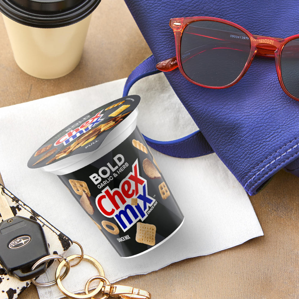 Chex Mix Bold Garlic and Herb snack cup in backpack for quick bites