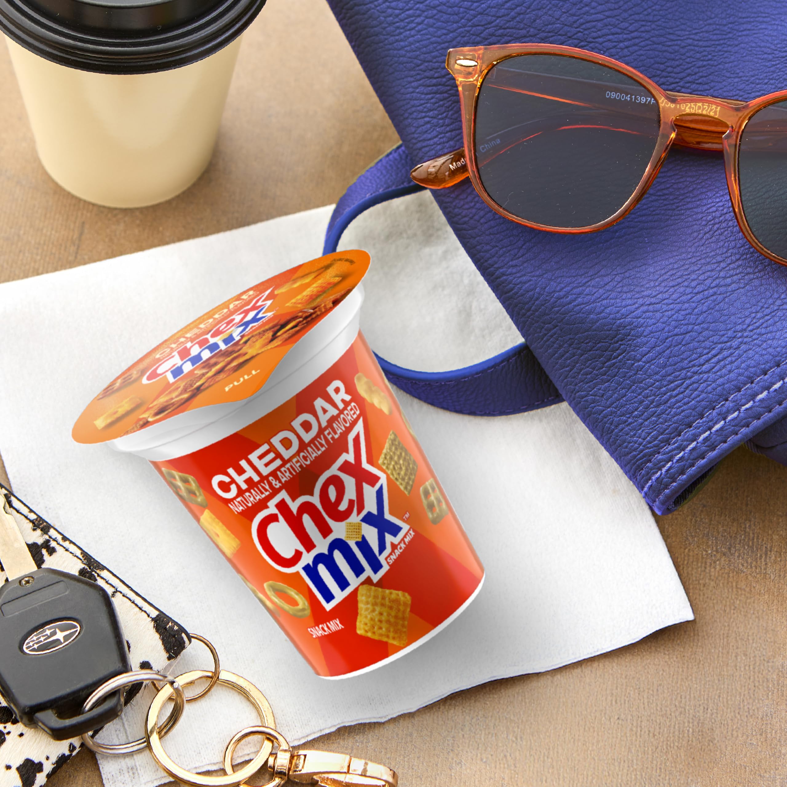 Chex Mix Cheddar Snack Cup in lunchbox for quick bites.