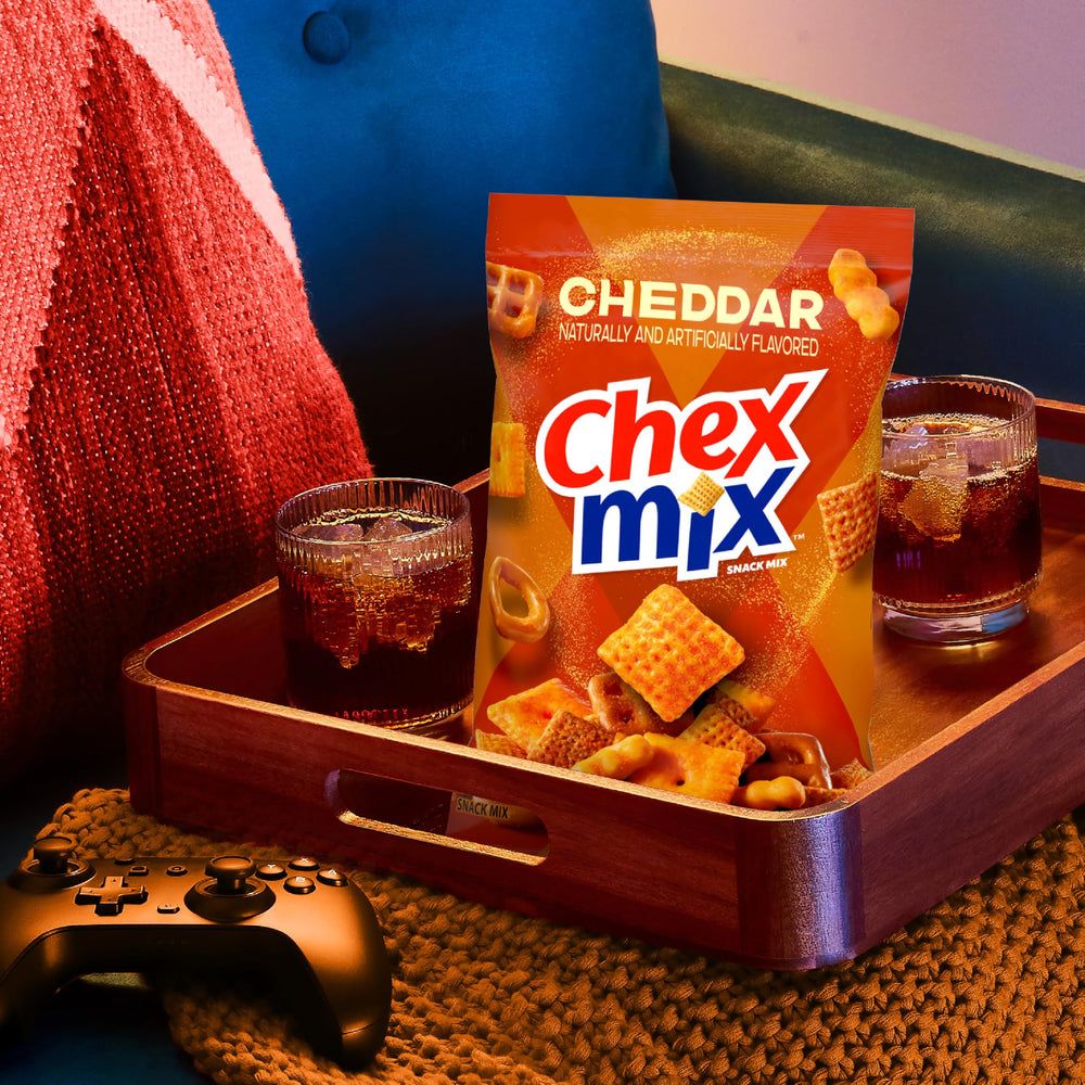 Chex Mix Cheddar Snack Mix square pretzels offer salty crunch