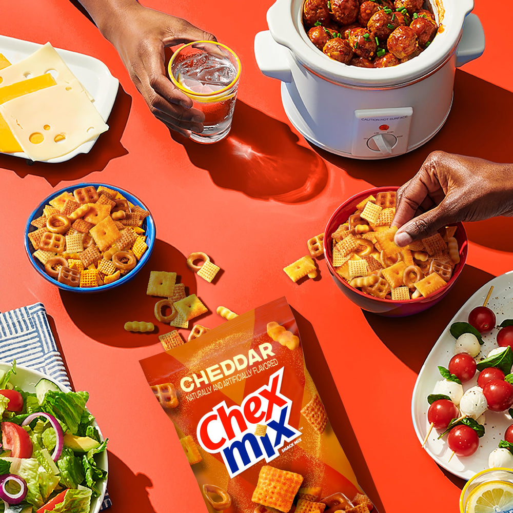 Chex Mix Cheddar combines square pretzels with crackers for a cheddary combo.