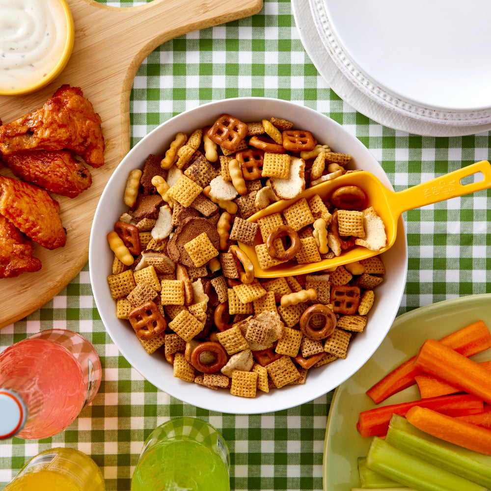 Chex Mix Traditional being poured for quick snacking