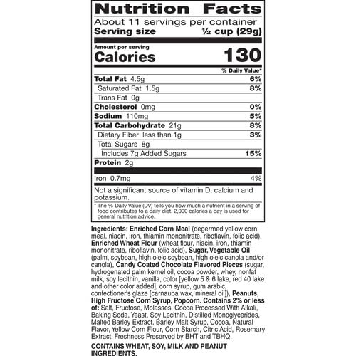 Chex Mix Turtle Snack Mix ingredients spread with pretzels and caramel popcorn.