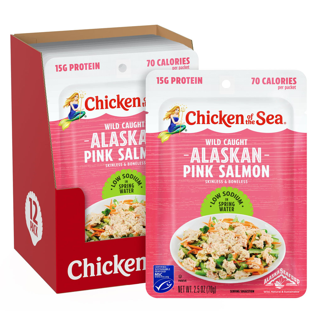 Chicken of the Sea Alaskan pink salmon packet opened over a salad for a protein boost.