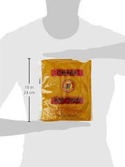 Close-up of Chief Curry Powder texture with vibrant color.