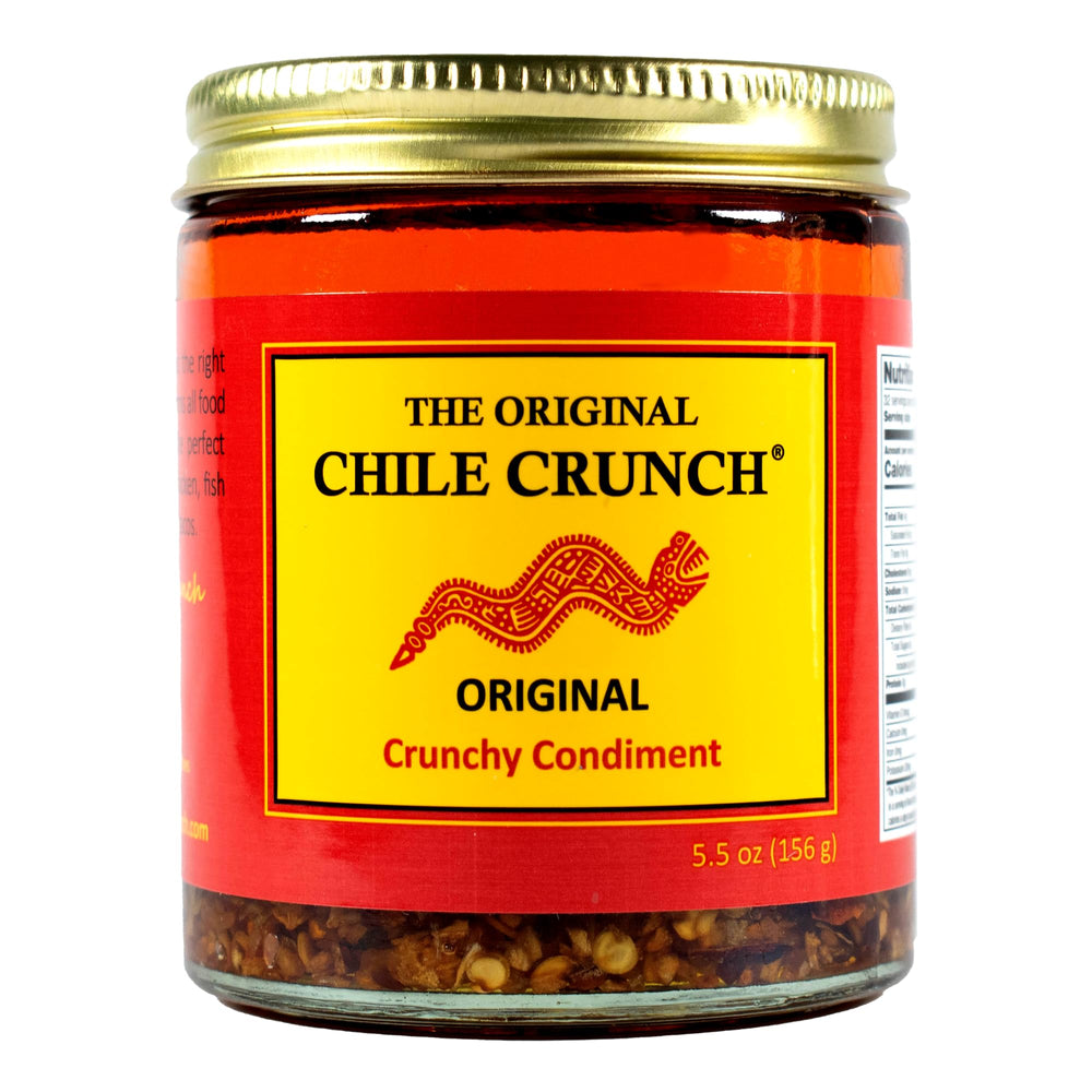Chile Crunch Original bottle close-up showcasing bold roasted chiles for tacos and bowls.