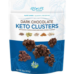 chimoo dark chocolate keto clusters closeup shows pecans, almonds, and coconut with super seeds.