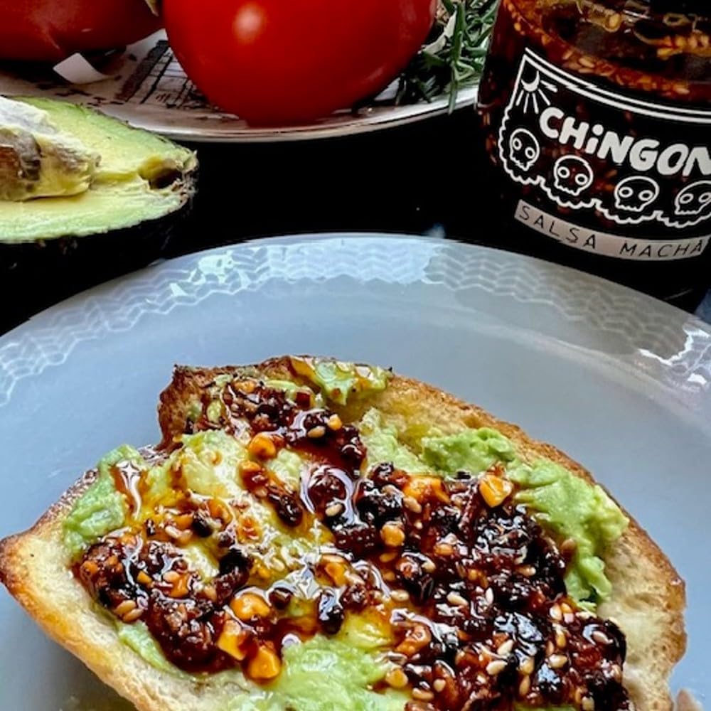 CHiNGONAs Salsa Macha being poured as a finishing oil on a dish