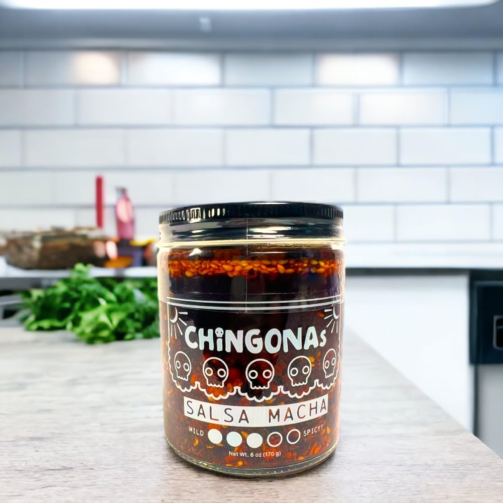 Close-up of CHiNGONAs Salsa Macha ingredients highlighting chiles, garlic, nuts