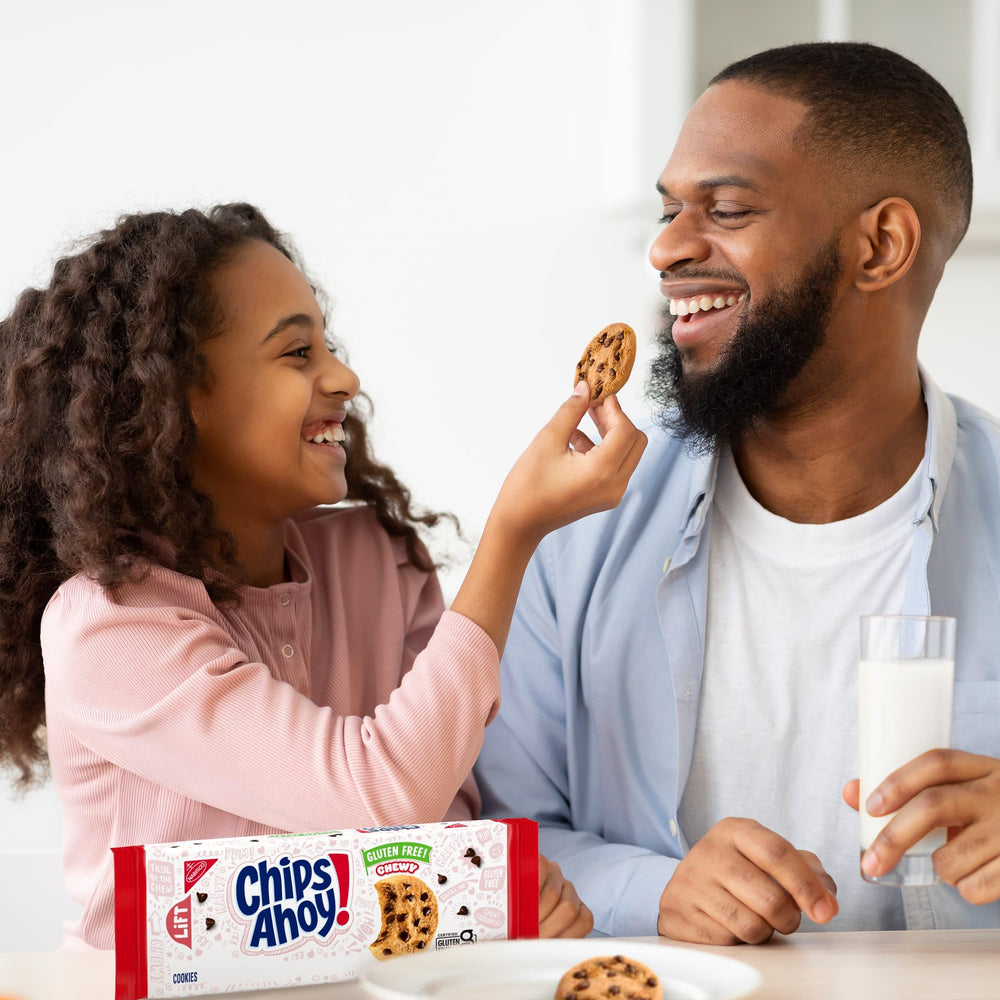 CHIPS AHOY! gluten free cookies dipped in milk for a quick treat.