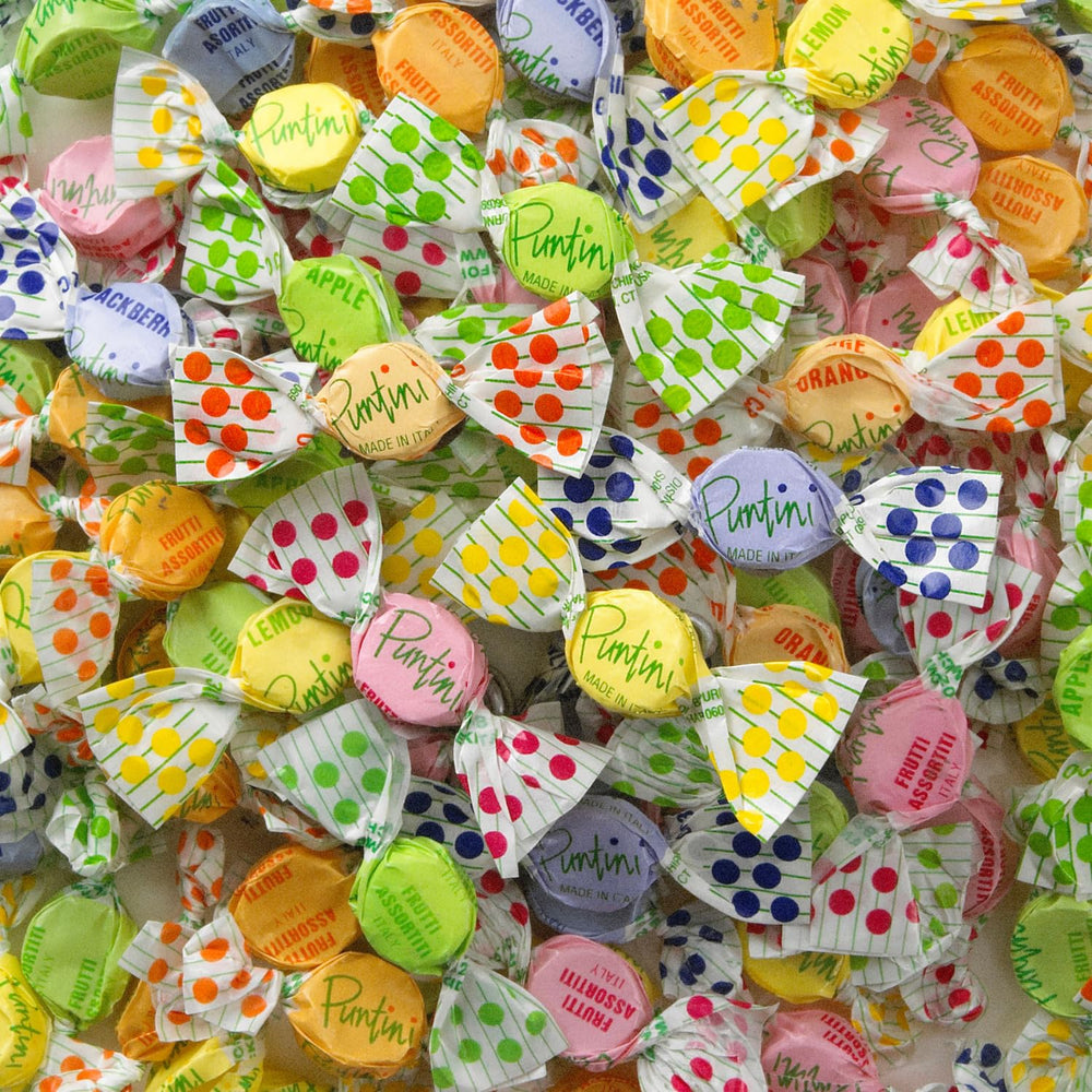 Assorted Puntini flavors arranged as a party or travel snack.