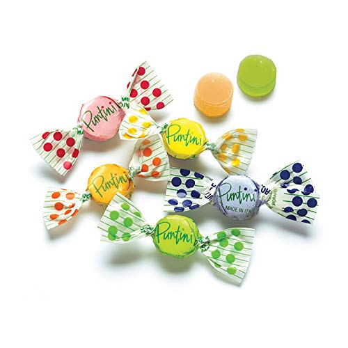 Puntini strawberry flavor jujubes close-up with bright color and aroma.