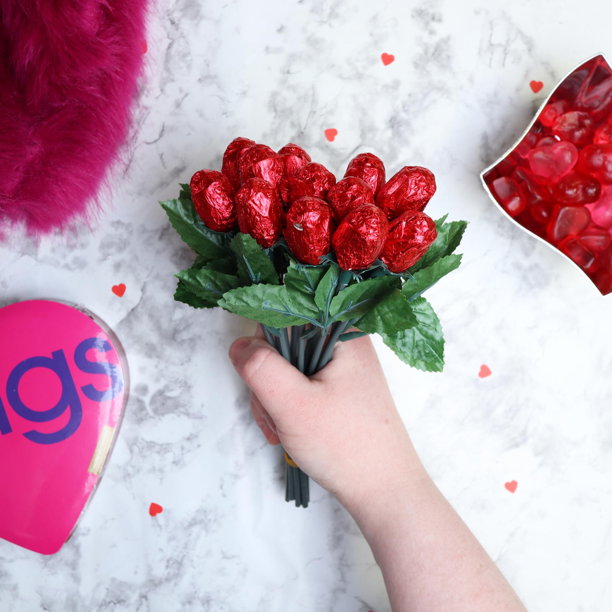Chocolate Roses table display creates a charming celebration centerpiece.