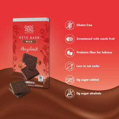 ChocZero hazelnut bark close-up showing roasted hazelnuts in milk chocolate.