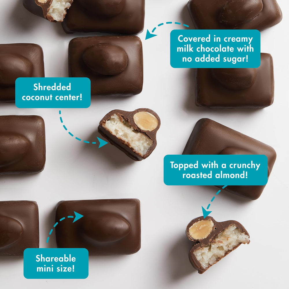 Cross-section of a ChocZero Mini Oasis Bar with chocolate, coconut, and almond layers.