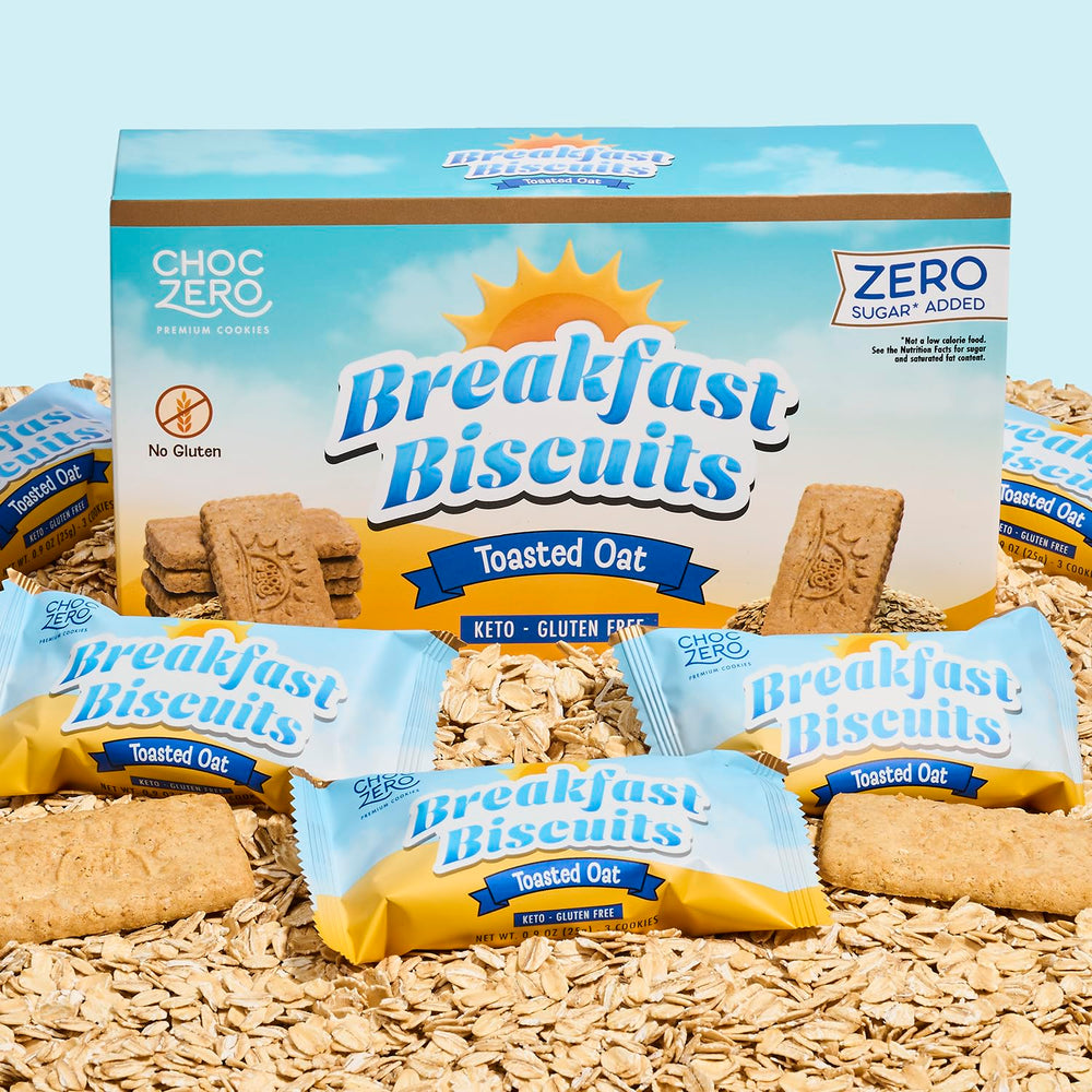 ChocZero toasted oat breakfast biscuits beside tea, ideal mid-morning snack.