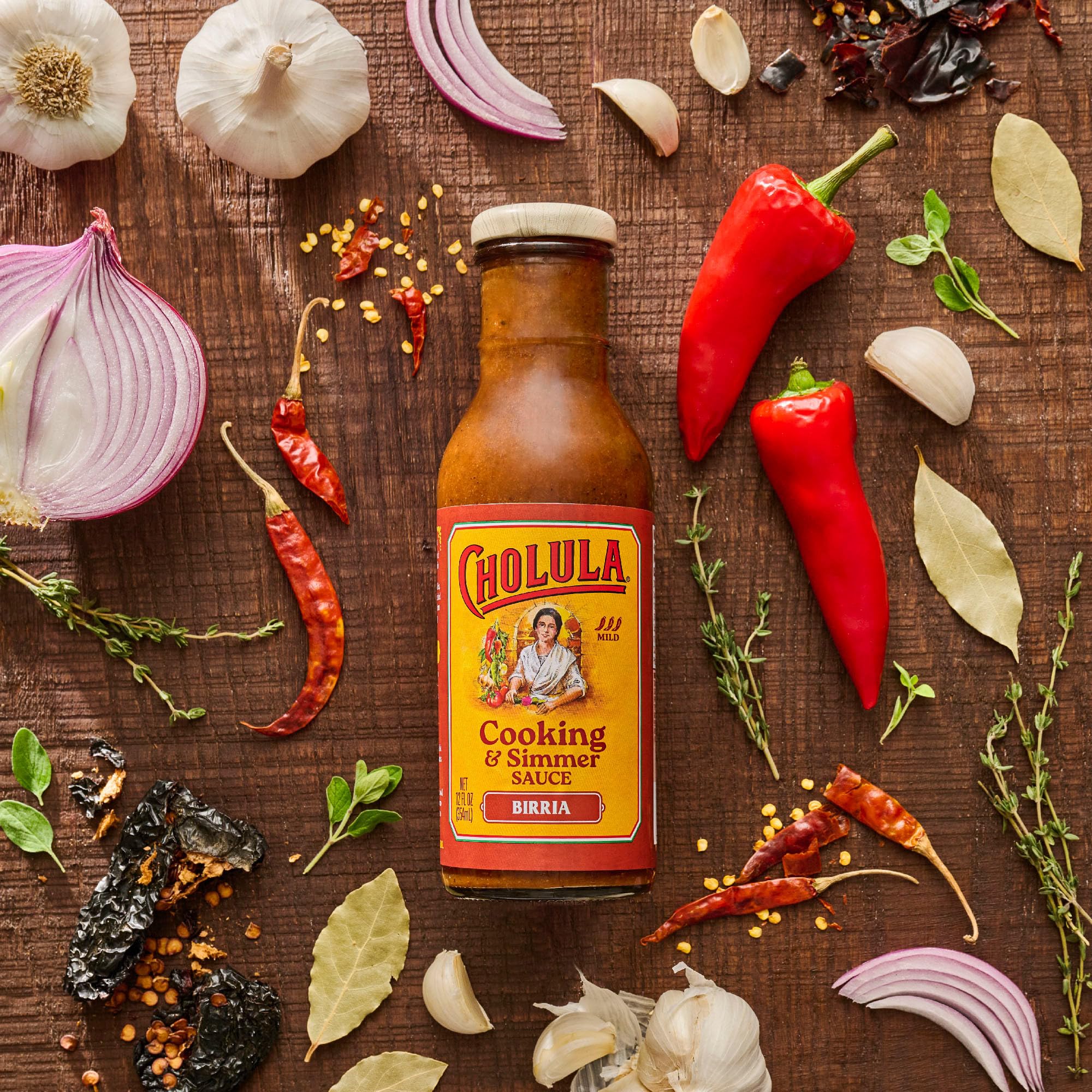 Cholula Birria dipping sauce jar ready for dunking.