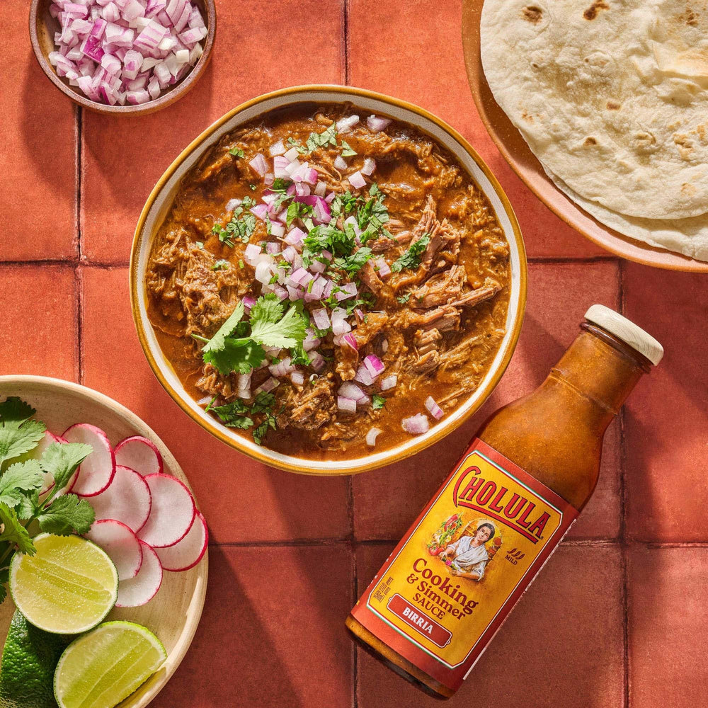 Cholula Birria stew serving highlights rich color and aroma.