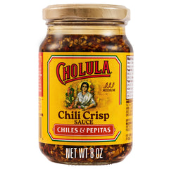 Cholula Chili Crisp bottle with wooden cap, ready to spice tacos.