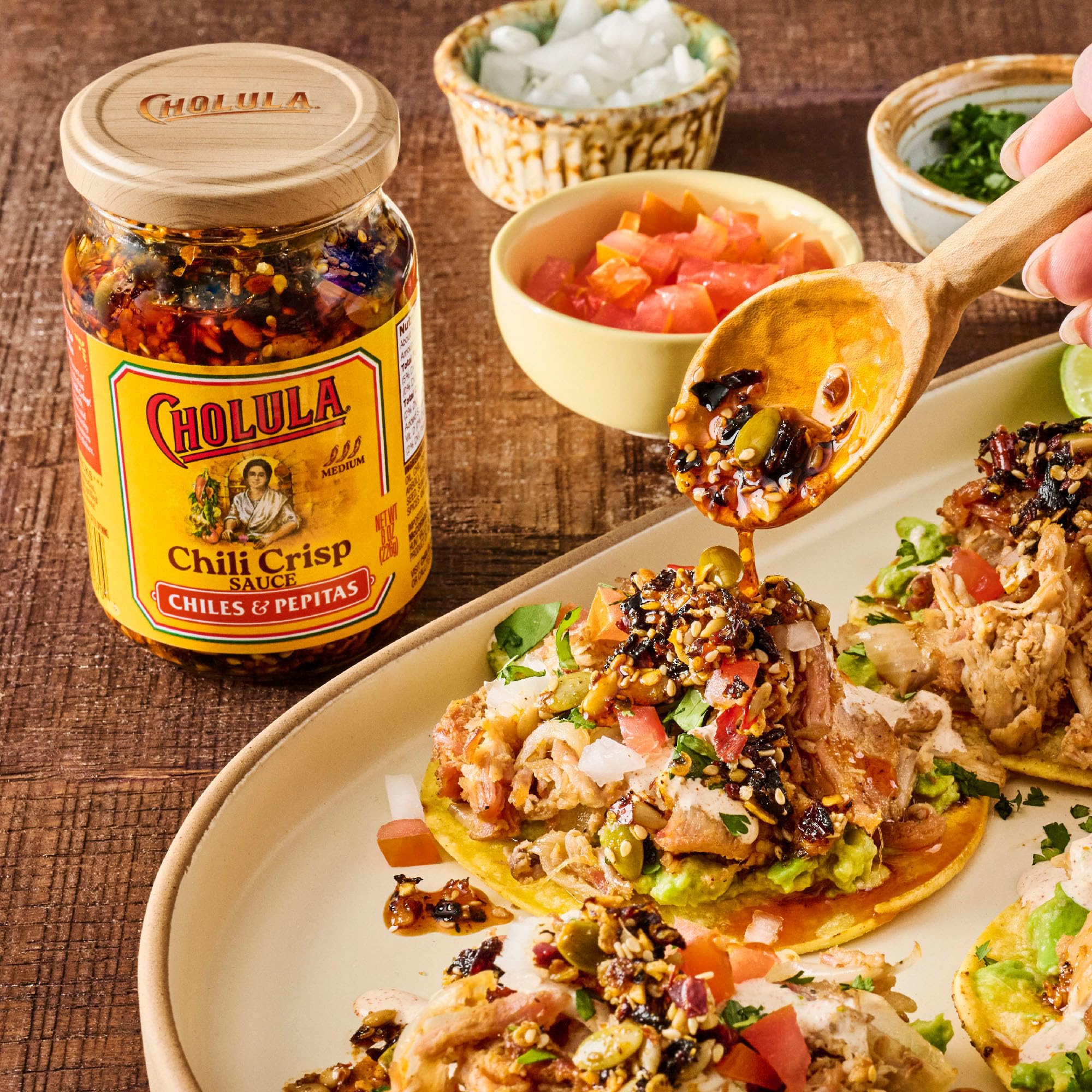 Cholula Chili Crisp with pepitas enhances roasted meats.
