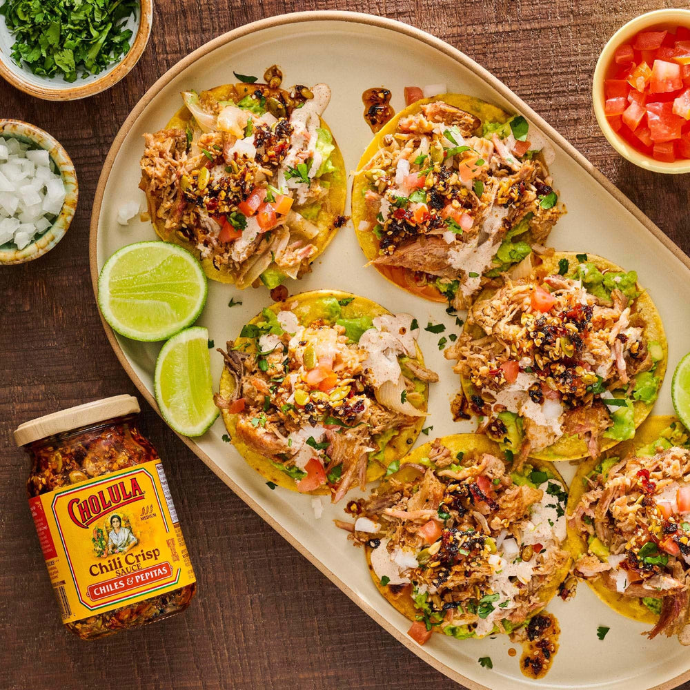 Cholula Chili Crisp over tostadas enhances kick and crunch.