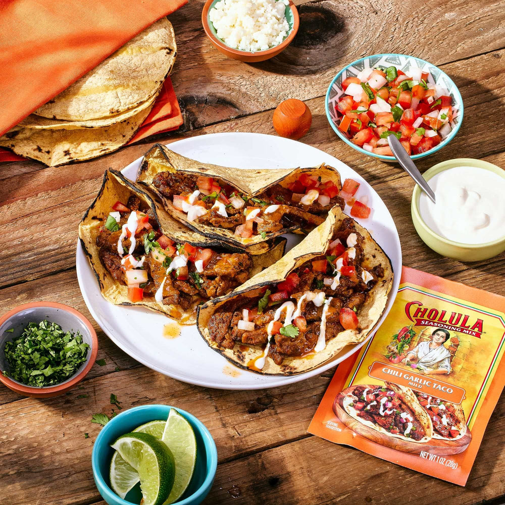 Cholula taco seasoning mix on a taco plate for vibrant weeknight meals.
