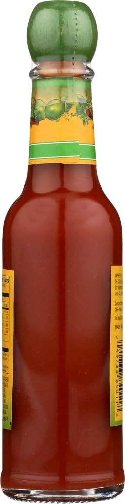 Cholula Chili Lime pour action suggests great pairing on breakfast eggs.