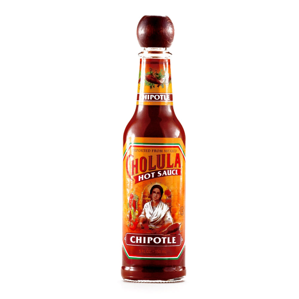 Cholula Chipotle hot sauce bottle with smoky flavor for tacos and eggs.