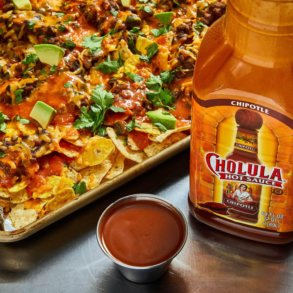 Cholula Chipotle Hot Sauce with pork dishes balancing spice and smoke.