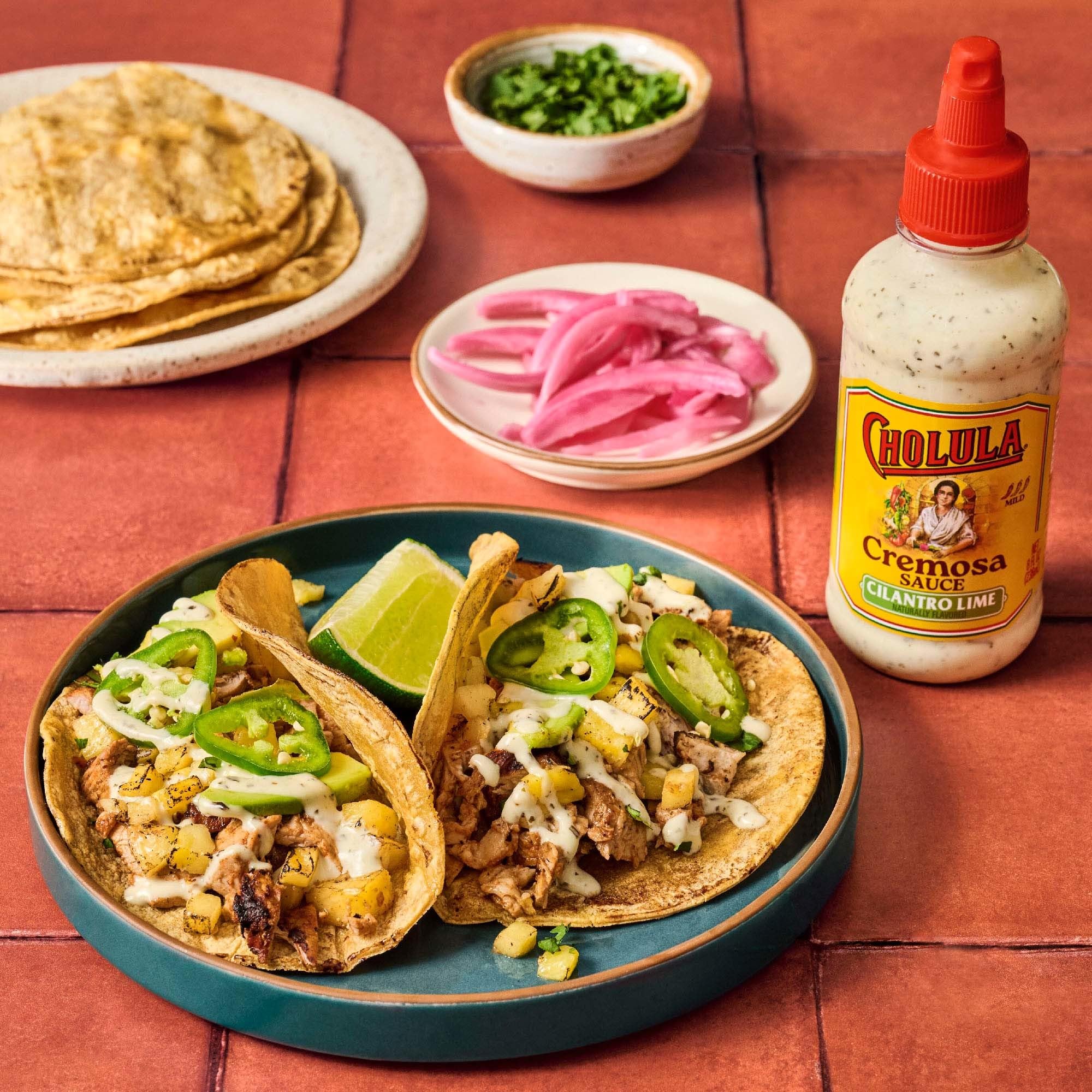 Cholula Cremosa Cilantro Lime rice bowl topping adds creaminess.