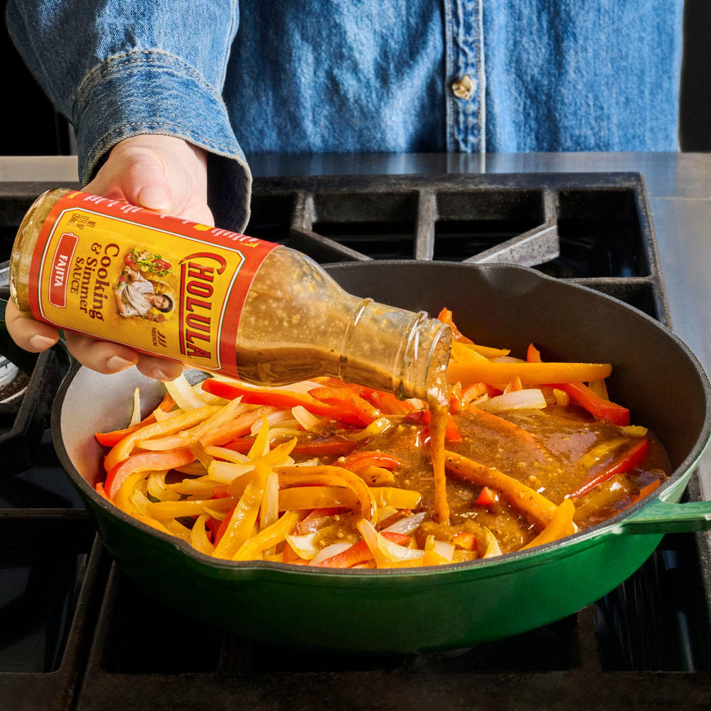 Cholula Fajita Sauce whisked into sizzling shrimp fajitas for zest.