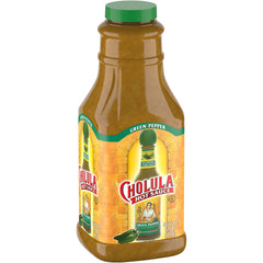 Cholula Green Pepper Hot Sauce bottle on the counter ready to season eggs.