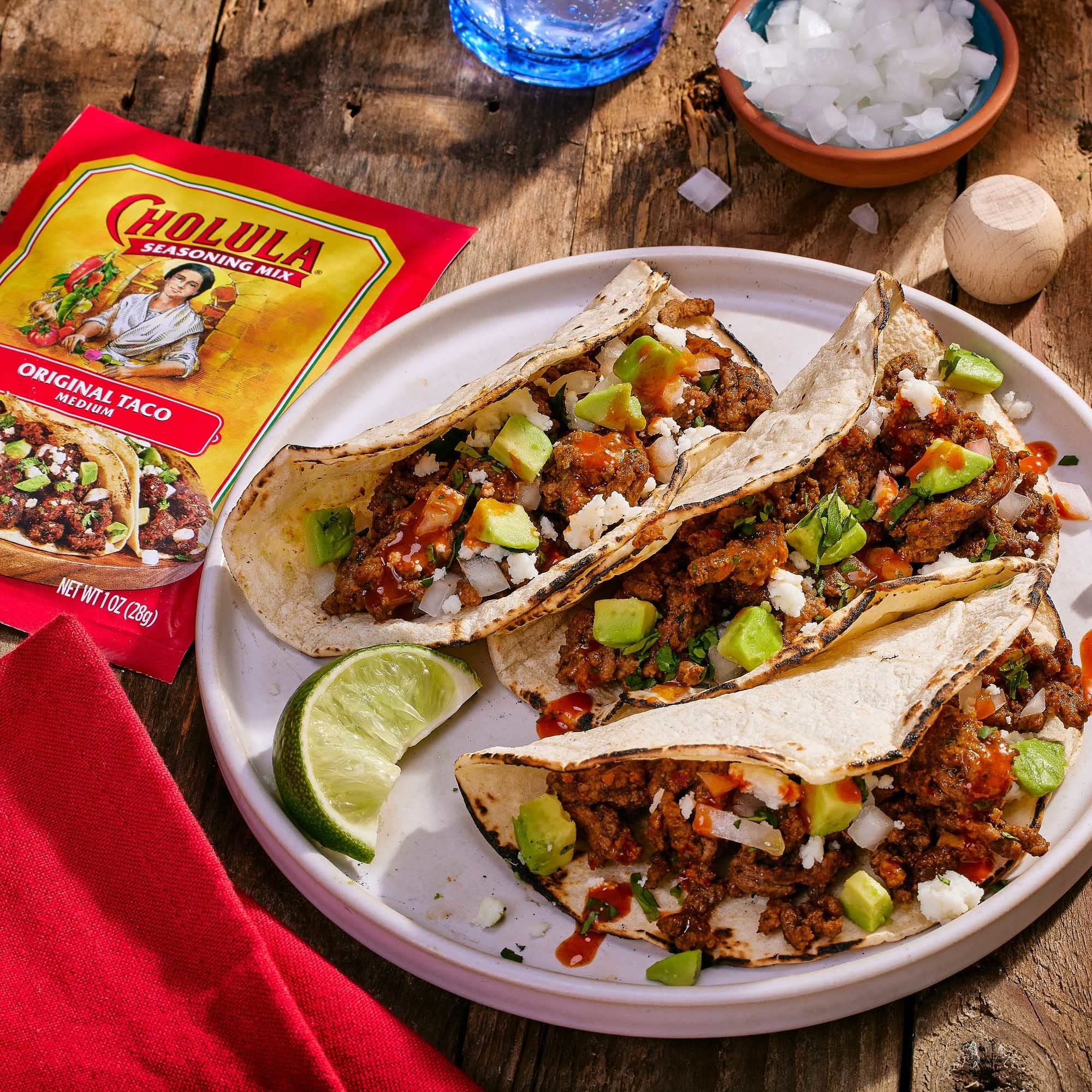 Cholula lime-serving with seafood tacos for bright finishing touch.