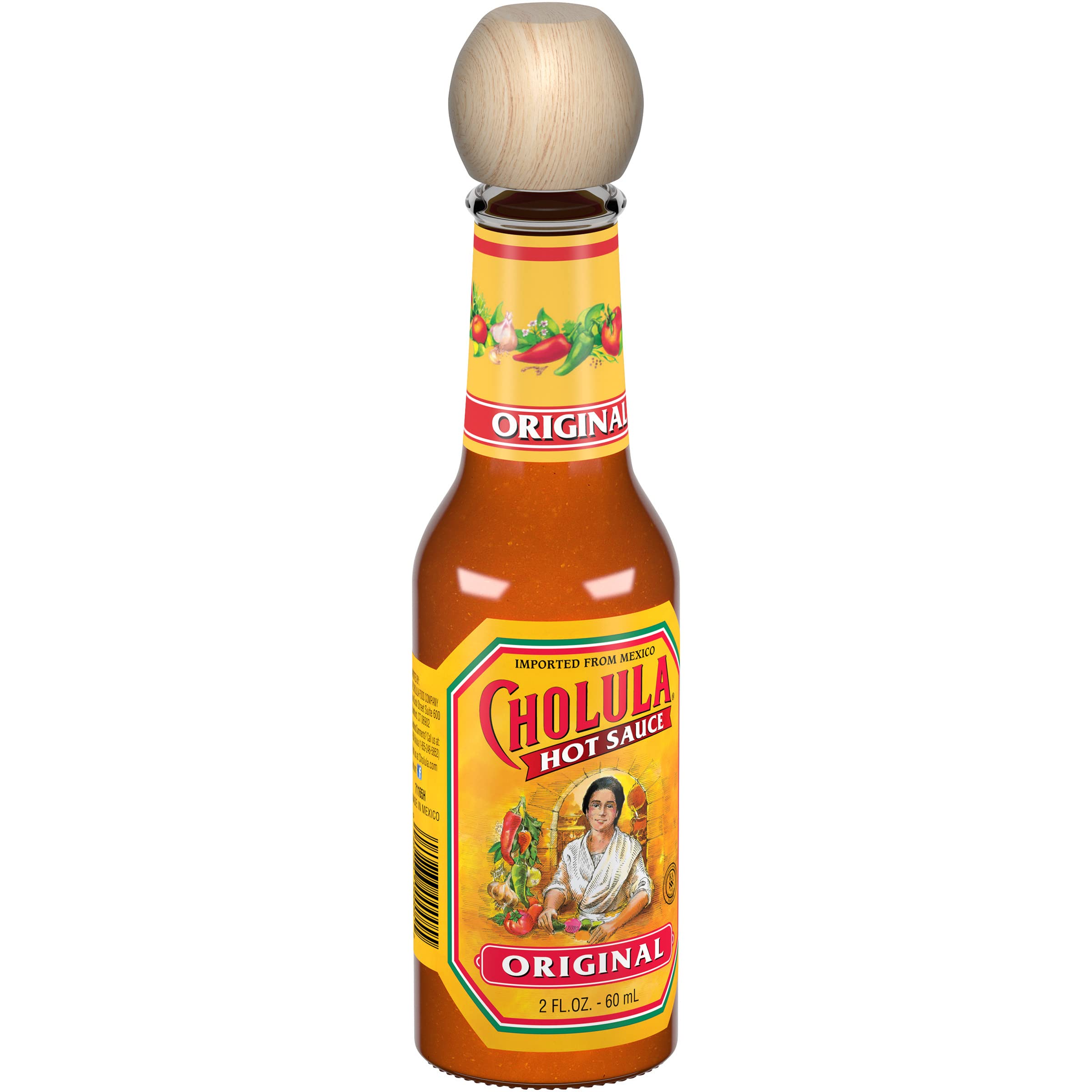 Cholula Original Hot Sauce pours a smooth stream onto eggs for breakfast flavor.