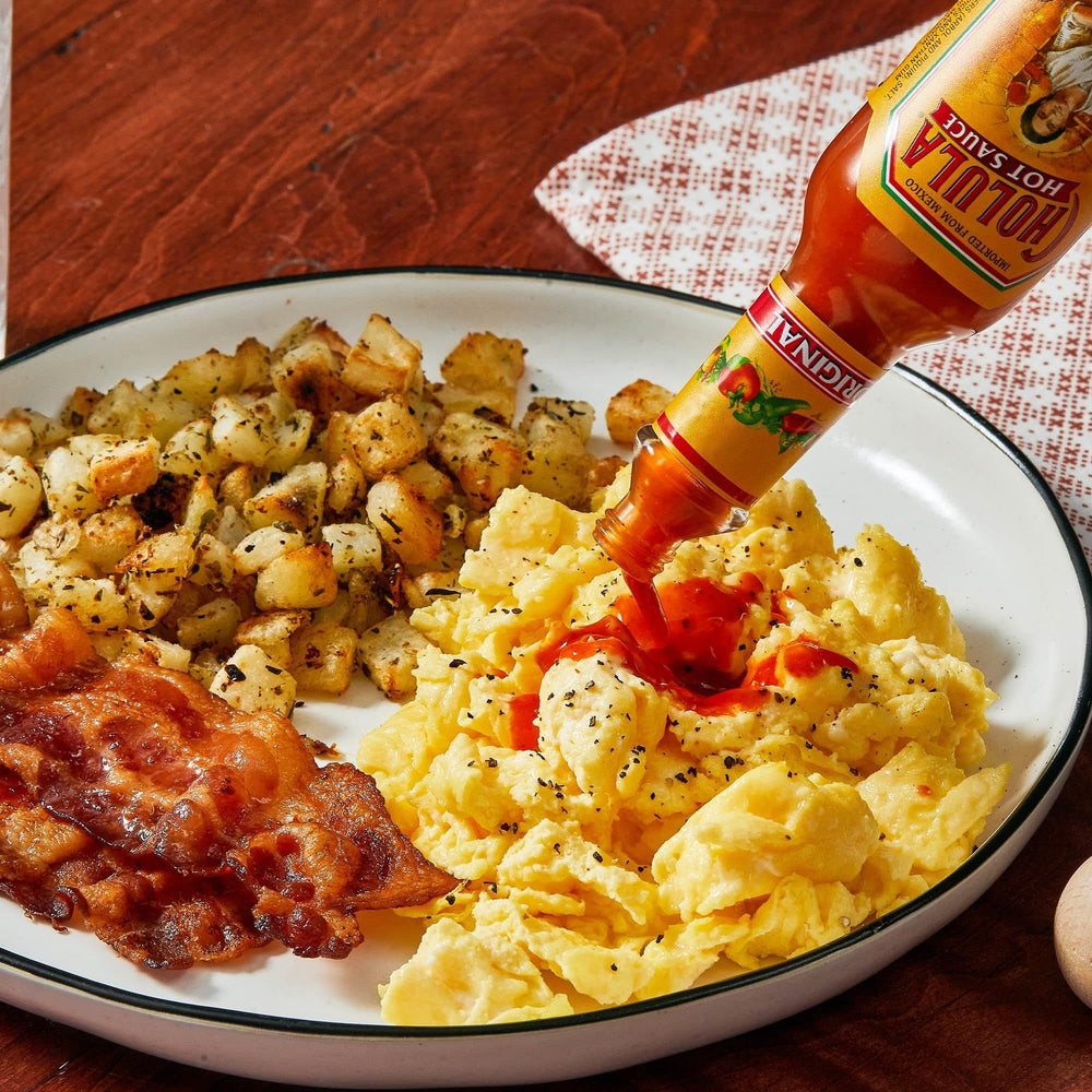 Cholula Original Hot Sauce drizzled over a burrito bowl elevates sensory profile.