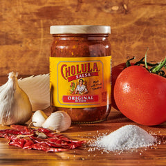 Tomatoes and arbol peppers in Cholula Original Salsa