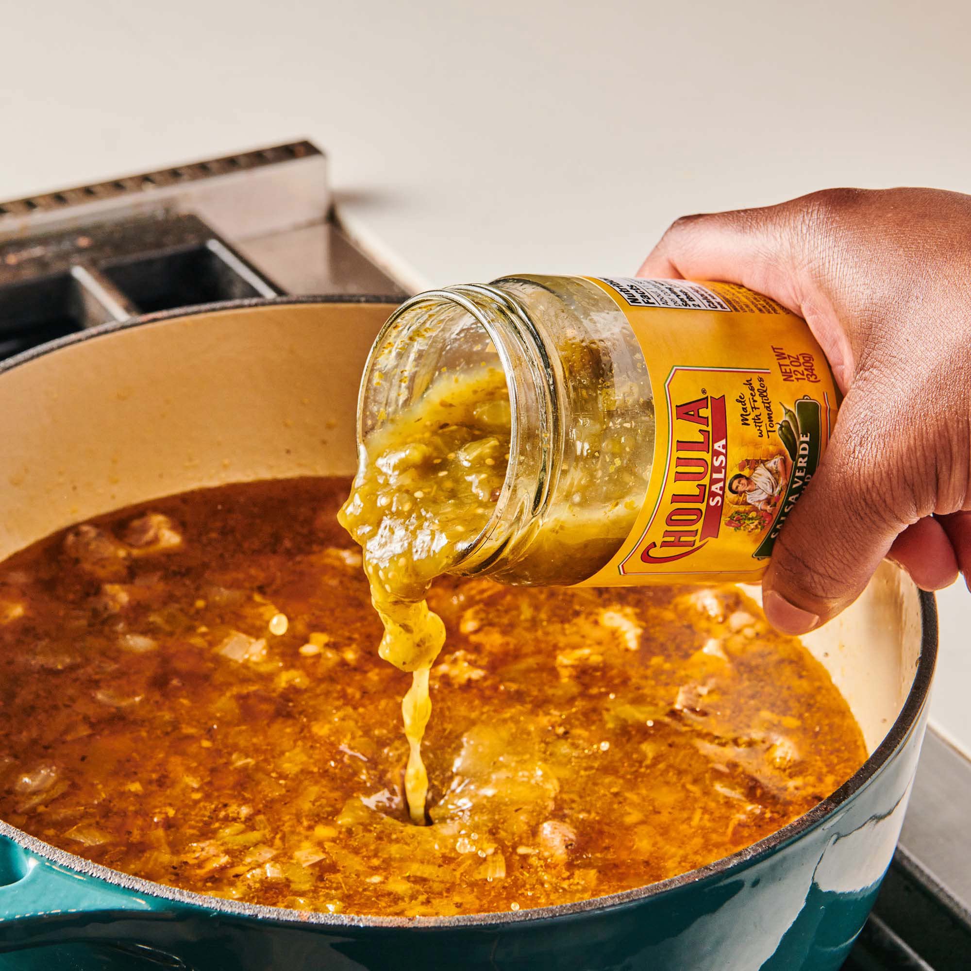 Cholula Salsa Verde on burritos enhances bowls with verde brightness.