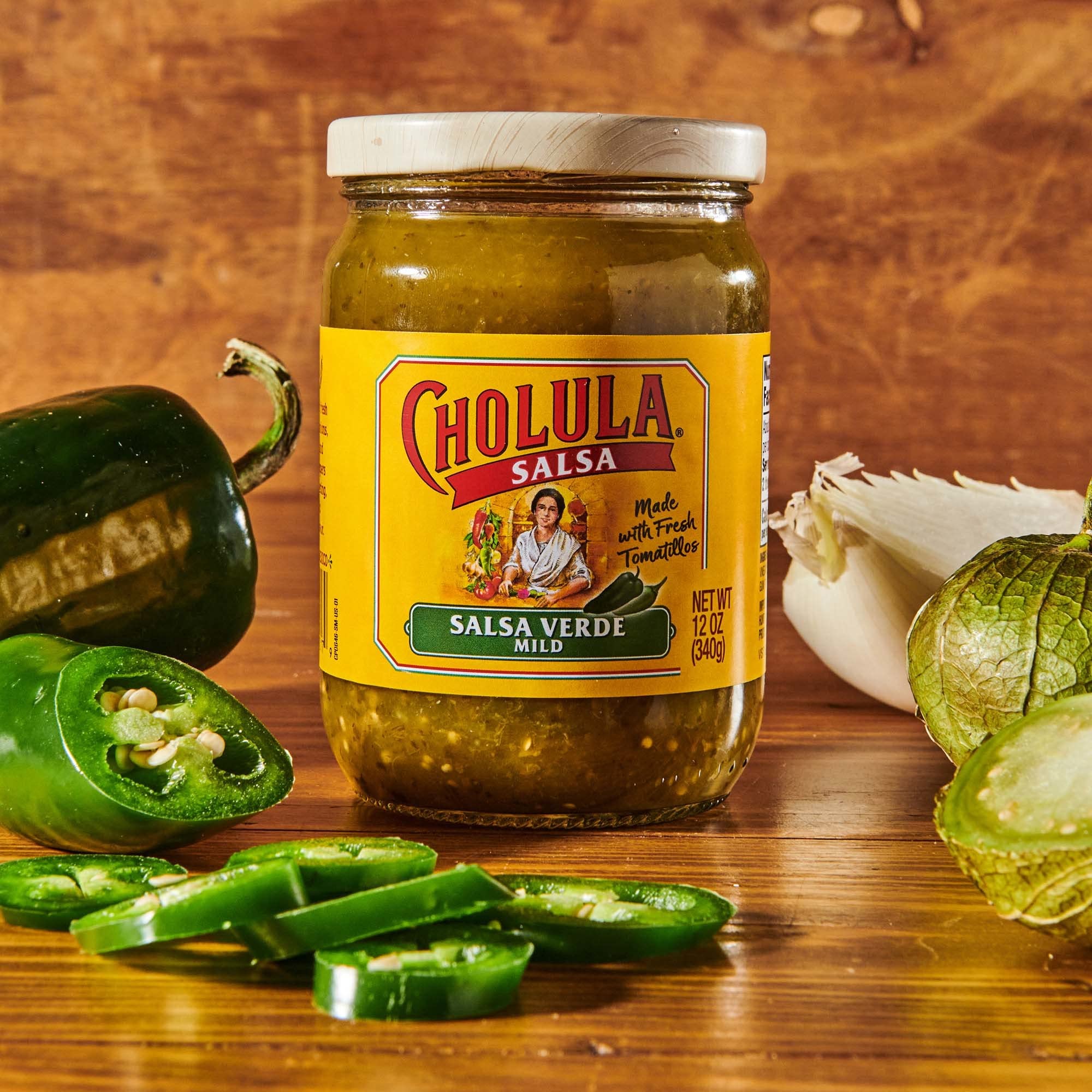 Cholula Salsa Verde dip with tortilla chips for a family-friendly snack.