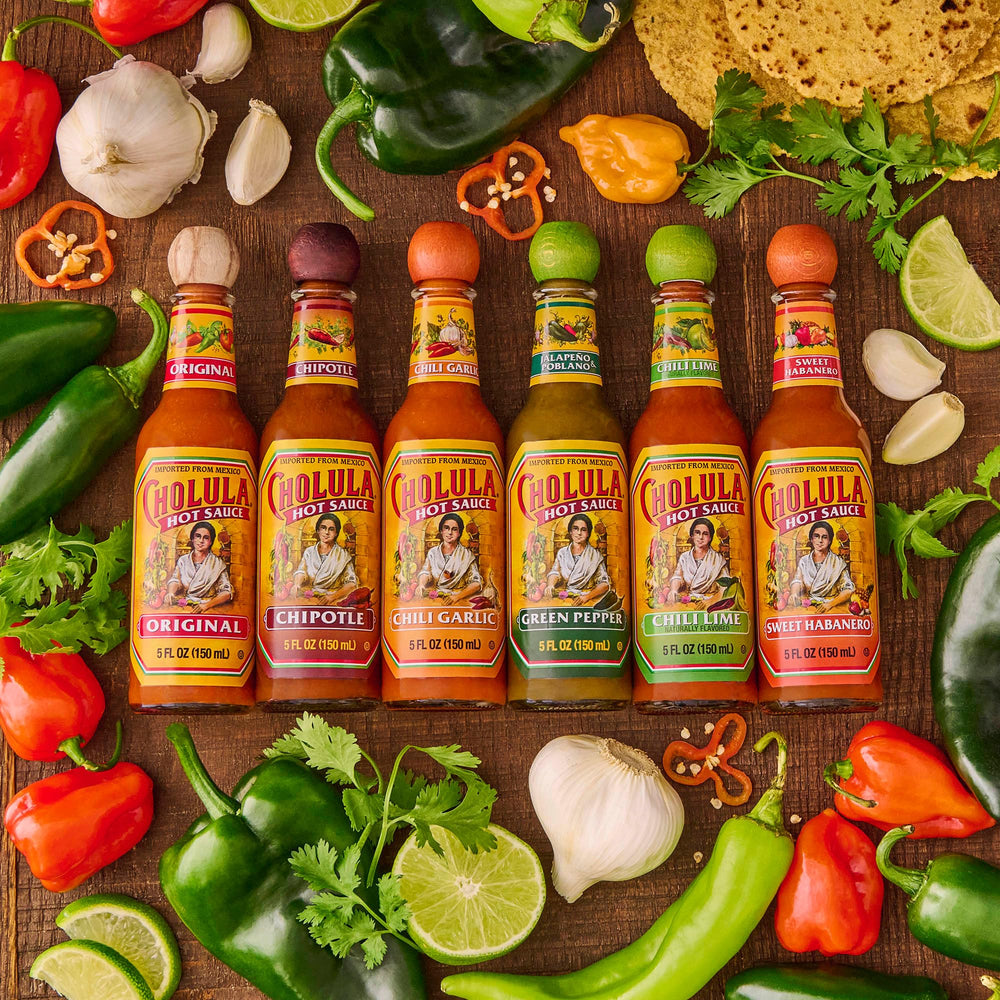Cholula on tacos for authentic Mexican flavor.