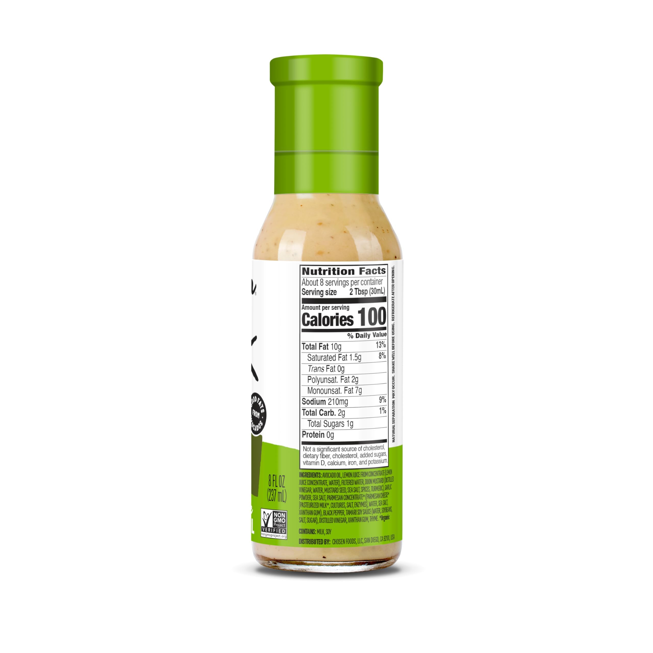 Chosen Foods Avocado Oil Caesar Dressing being poured over greens for creamy salads.