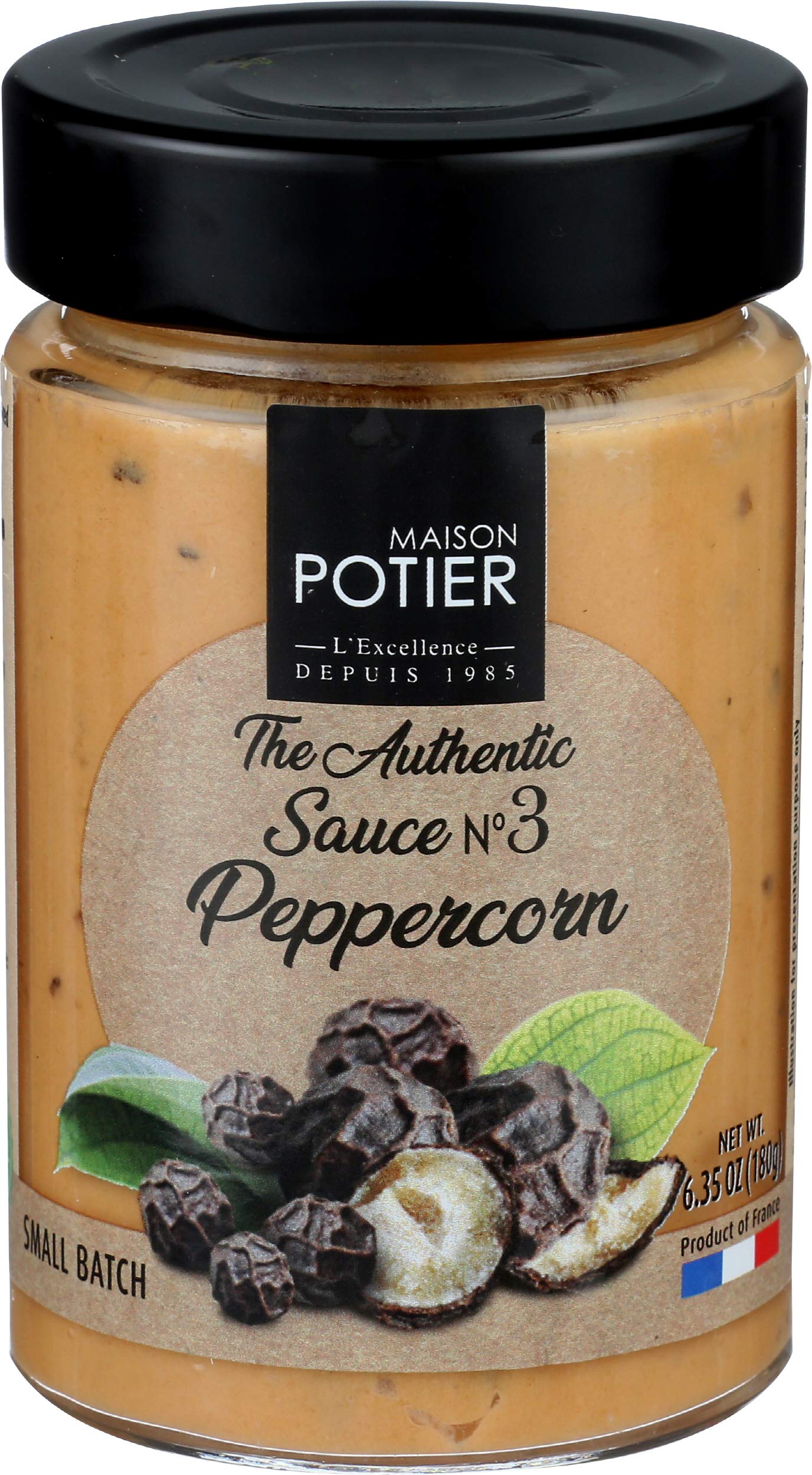 Christian Potier Peppercorn Sauce bottle being poured, adds a gluten-free, rich pepper finish