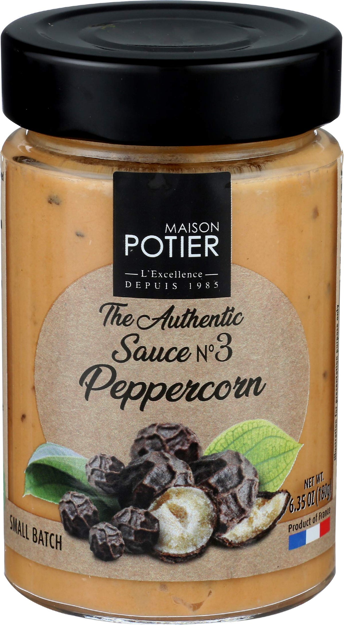 Christian Potier Peppercorn Sauce bottle being poured, adds a gluten-free, rich pepper finish