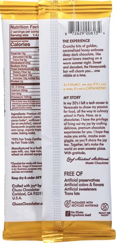 Chuao Chocolatier dark chocolate bar slice, rich cocoa glow on a clean surface.