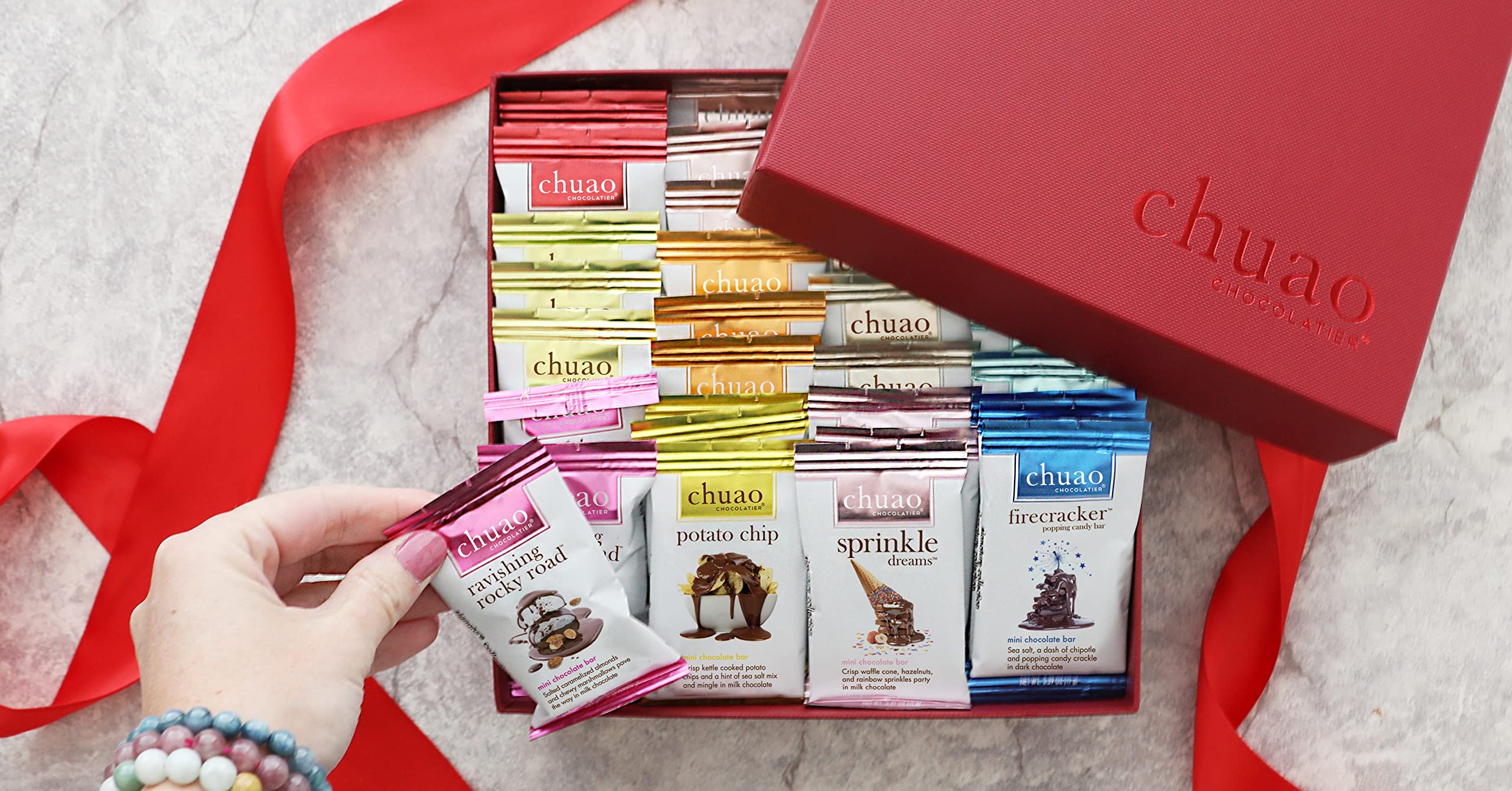Chuao Chocolatier gift box holiday display invites celebrations.